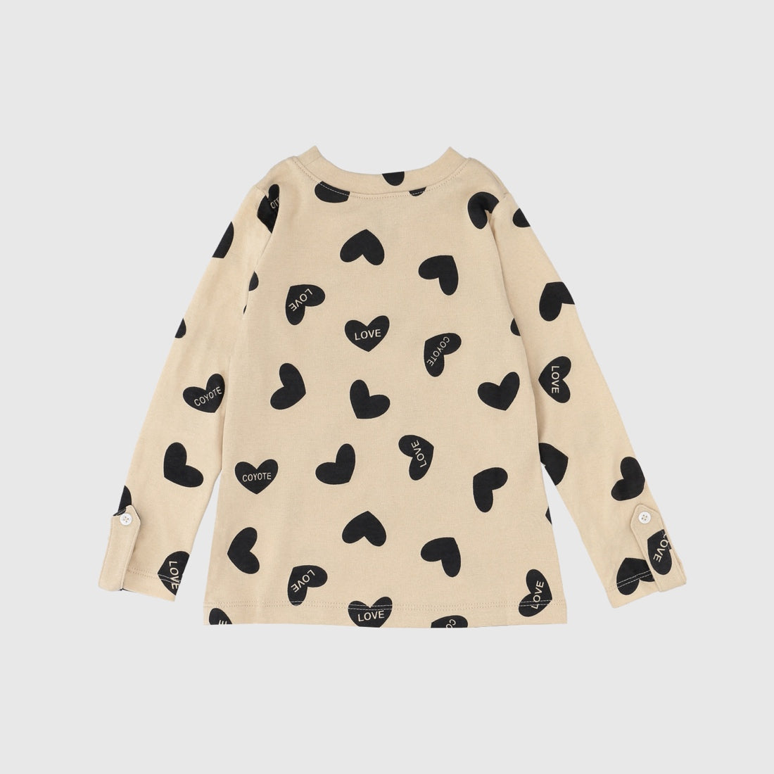 Polera beige corazones negros algodón peruano