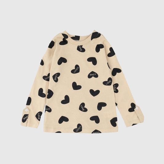 Polera beige corazones negros algodón peruano